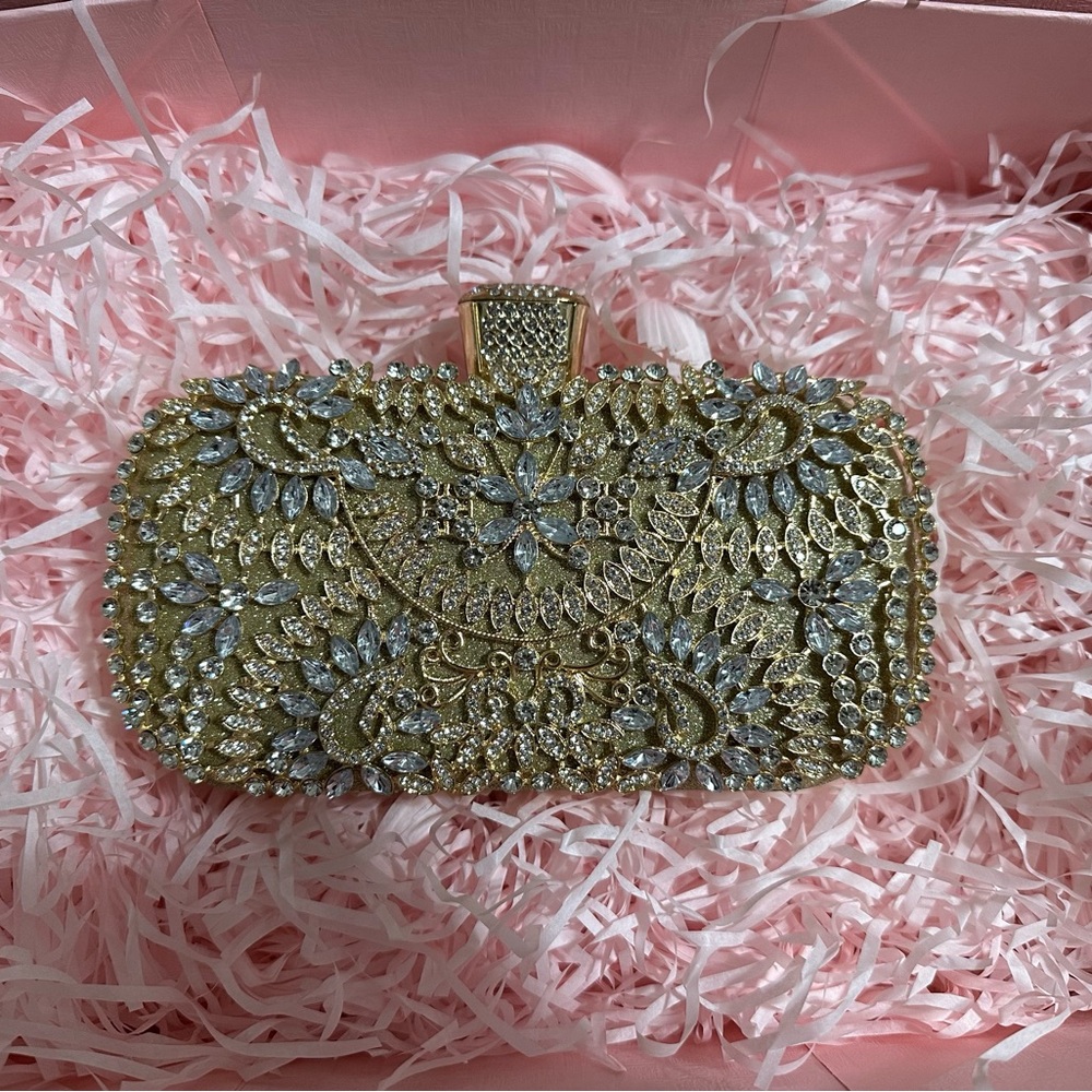 Gold and Silver Ornate Clutch with Floral Motifs